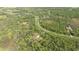Aerial view highlighting home's private setting within a secluded community at 9291 Swaying Branch Rd, Sarasota, FL 34241