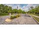 Gated entrance to a community with security at 9291 Swaying Branch Rd, Sarasota, FL 34241