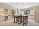Spacious kitchen with large island, stainless steel appliances, and white cabinets at 9291 Swaying Branch Rd, Sarasota, FL 34241