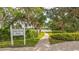 Lake Wood Park path leads to a tranquil lake view at 9291 Swaying Branch Rd, Sarasota, FL 34241