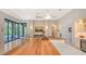 Gourmet kitchen boasts a large island with wood countertop, stainless steel appliances, and views to the backyard at 9291 Swaying Branch Rd, Sarasota, FL 34241