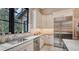 Modern kitchen features stainless steel appliances and a large window at 9291 Swaying Branch Rd, Sarasota, FL 34241