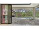 Relaxing pool and patio area with lush landscaping and privacy at 9291 Swaying Branch Rd, Sarasota, FL 34241