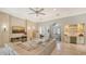 Spacious living room with large sectional sofa and built-in entertainment center at 9291 Swaying Branch Rd, Sarasota, FL 34241
