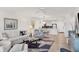 Open concept living area with kitchen and dining area visible at 2100 Benjamin Franklin Dr # 205, Sarasota, FL 34236