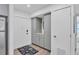 Modern condo entry with built-in storage at 2100 Benjamin Franklin Dr # 205, Sarasota, FL 34236