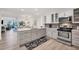Modern kitchen with an island and open concept design at 2100 Benjamin Franklin Dr # 205, Sarasota, FL 34236