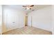 Bedroom with double door closet and ceiling fan at 3718 Mossy Limb Ct, Palmetto, FL 34221