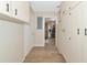 Spacious laundry room with built-in cabinetry and vinyl flooring at 1511 Cloister Dr, Sun City Center, FL 33573