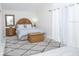 Comfortable guest bedroom with a king-size bed and neutral decor at 6317 Werner Ave, New Port Richey, FL 34652