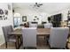 Farmhouse dining table with gray chairs at 6317 Werner Ave, New Port Richey, FL 34652