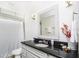 Bathroom with granite countertop and shower/tub combo at 6317 Werner Ave, New Port Richey, FL 34652