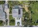 Aerial view showcasing the house, pool, and surrounding landscape at 6317 Werner Ave, New Port Richey, FL 34652