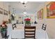 Bright dining room with a table for four and mirrored wall at 4802 51St W St # 1010, Bradenton, FL 34210
