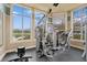 Fitness center with modern equipment and large windows at 4802 51St W St # 1010, Bradenton, FL 34210