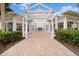 Brick walkway under a charming pergola at 4802 51St W St # 1010, Bradenton, FL 34210