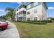 Two-story building with light beige and teal siding at 4802 51St W St # 1010, Bradenton, FL 34210