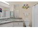 Clean bathroom with granite vanity and a shower/tub combo at 4802 51St W St # 1010, Bradenton, FL 34210
