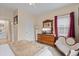 Bedroom with a king-size bed and an antique vanity at 4802 51St W St # 1010, Bradenton, FL 34210