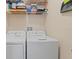 Stackable washer and dryer in a convenient laundry room at 4802 51St W St # 1010, Bradenton, FL 34210