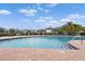 Inviting community pool with brick deck and ample seating at 4802 51St W St # 1010, Bradenton, FL 34210