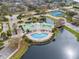 Community pool with surrounding lounge area at 4802 51St W St # 1010, Bradenton, FL 34210