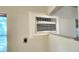 Close-up of a window AC unit mounted in a wall at 1570 Pleasant Rd # J-26, Bradenton, FL 34207