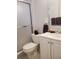 Clean bathroom with shower/tub combo and white vanity at 2083 Canal Dr # L32, Bradenton, FL 34207