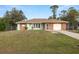 Newly painted light green ranch home with a 1 car garage at 21024 Baffin Ave, Port Charlotte, FL 33954