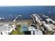 Aerial view of waterfront community with tennis court and pool at 2303 89Th Nw St, Bradenton, FL 34209