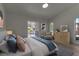 Comfortable bedroom with natural light, light gray walls and tasteful decor at 2303 89Th Nw St, Bradenton, FL 34209
