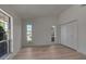 Bright bedroom featuring two windows and a closet at 2303 89Th Nw St, Bradenton, FL 34209