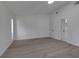 Spacious bedroom with light wood floors, white walls, and ample closet space at 2303 89Th Nw St, Bradenton, FL 34209