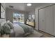 Inviting bedroom with neutral tones, a large window, and a comfortable bed at 2303 89Th Nw St, Bradenton, FL 34209