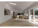 Cozy living room with modern furnishings, an open floor plan and access to the outdoors at 2303 89Th Nw St, Bradenton, FL 34209