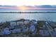 Condo building near water with sunset view at 236 Hidden Bay Dr # 504, Osprey, FL 34229