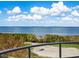 Panoramic water view with lush landscape and partial golf course view at 3070 Grand Bay Blvd # 632, Longboat Key, FL 34228