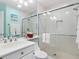 Clean bathroom with a walk-in shower and updated vanity at 3070 Grand Bay Blvd # 632, Longboat Key, FL 34228