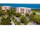 Waterfront property with lush landscaping and a golf course at 3070 Grand Bay Blvd # 632, Longboat Key, FL 34228