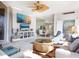 Spacious living area featuring a dining area and water views at 3070 Grand Bay Blvd # 632, Longboat Key, FL 34228