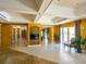 Bright and airy community room with access to outdoor patio at 3070 Grand Bay Blvd # 632, Longboat Key, FL 34228