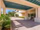 Covered building entrance with brick pavers and lush plants at 3070 Grand Bay Blvd # 632, Longboat Key, FL 34228