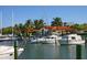 Luxury waterfront property with boats docked at a marina at 3070 Grand Bay Blvd # 632, Longboat Key, FL 34228
