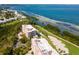 Stunning aerial view of waterfront property and golf course at 3070 Grand Bay Blvd # 632, Longboat Key, FL 34228