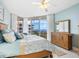 Main bedroom with water views and ample dresser storage at 3070 Grand Bay Blvd # 632, Longboat Key, FL 34228