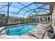 Inviting screened pool and spa with ample deck space at 3161 Bayou Sound, Longboat Key, FL 34228