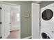Stackable washer and dryer in a small laundry room at 3919 Cape Haze Dr # 506, Rotonda West, FL 33947
