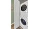 Stackable washer and dryer in a closet at 3919 Cape Haze Dr # 506, Rotonda West, FL 33947