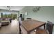 Small dining area with a wooden table and chairs at 3919 Cape Haze Dr # 506, Rotonda West, FL 33947