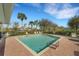 Inviting community pool with brick patio and lounge chairs at 3919 Cape Haze Dr # 506, Rotonda West, FL 33947